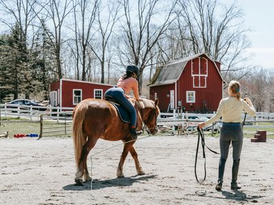 Person doing side lunges
